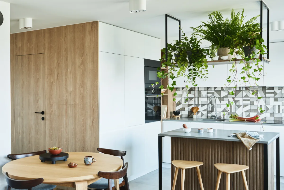 reforma integral de cocina y salón en cornellà en un piso pequño para conectarlos en un único ambiente